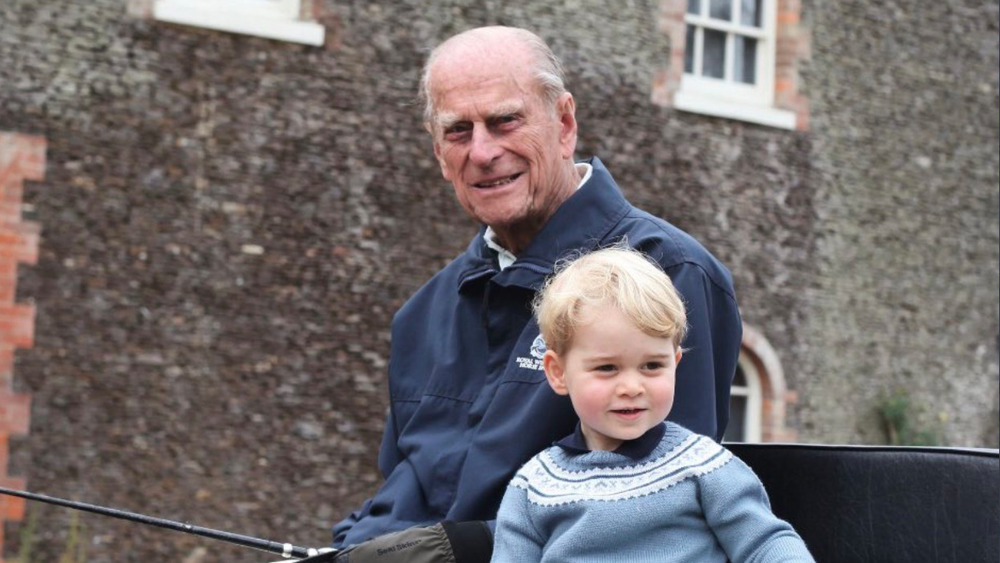 Prince Philip and baby Prince George smile