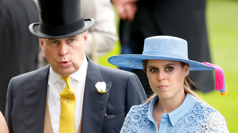 Prince Andrew and Princess Beatrice standing together