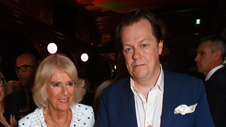 Queen Camilla and her son Tom Parker Bowles stand side by side