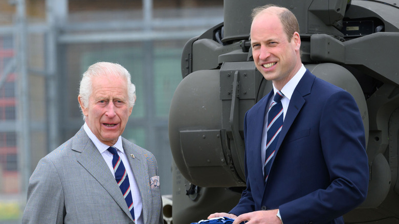 King Charles III and Prince William, Prince of Wales during the official handover in which King Charles III passes the role of Colonel-in-Chief of the Army air corps to Prince William, Prince of Wales