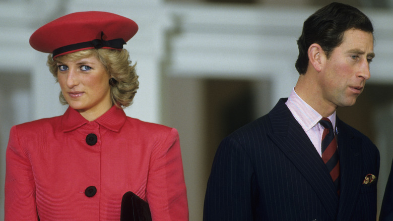 Diana, Princess of Wales, stands next to her husband, Charles, Prince of Wales, during a function held in their honor February 11, 1987