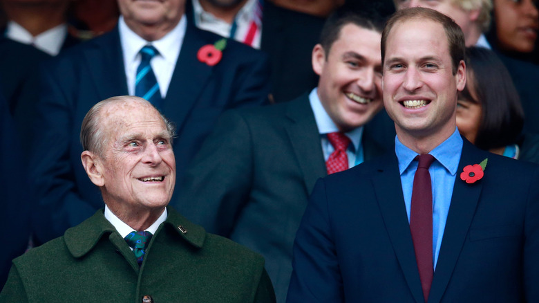 Prince William with grandfather Prince Philip.