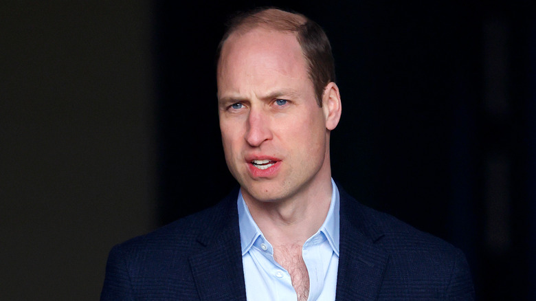 Prince William with a neutral expression