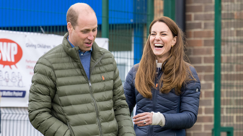 Kate Middleton and Prince William in a field