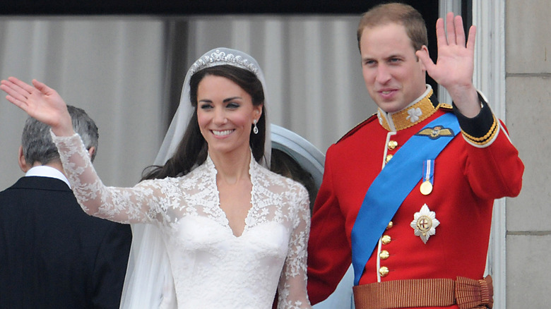 Princess Catherine and Prince William waving to crowd