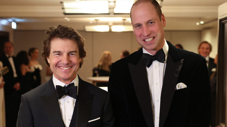 Tom Cruise and Prince William smiling