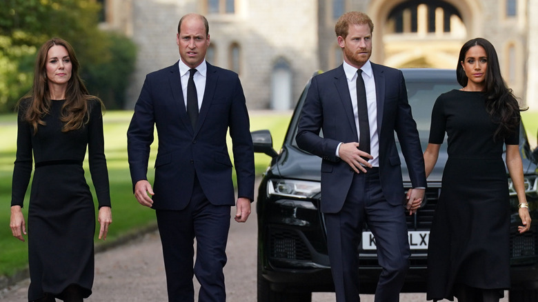 Harry and Meghan Markle walking with Prince William and Princess Kate