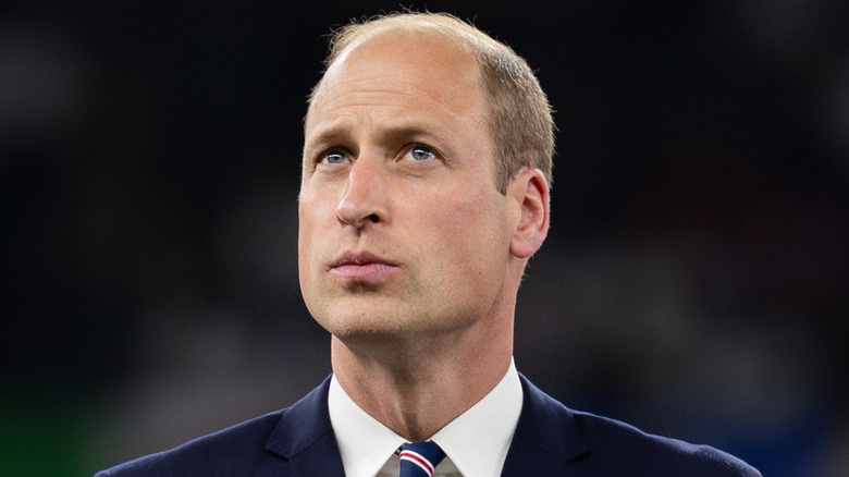 Prince William looking upward