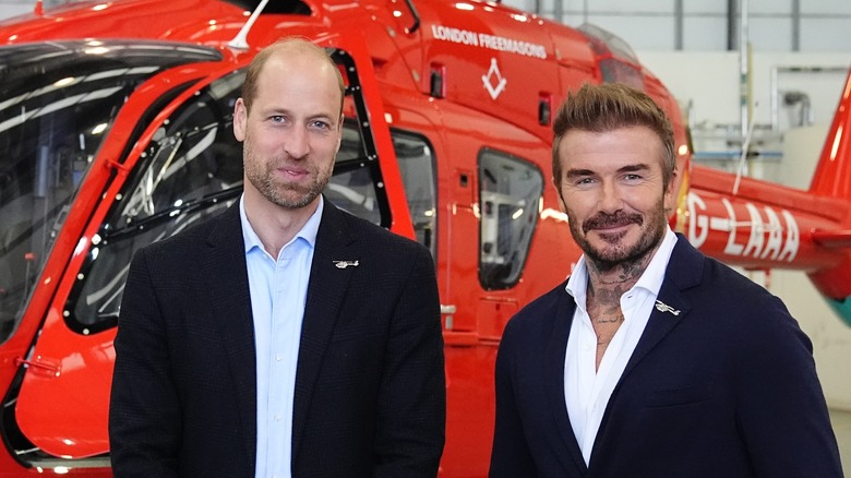 Prince William and David Beckham smiling