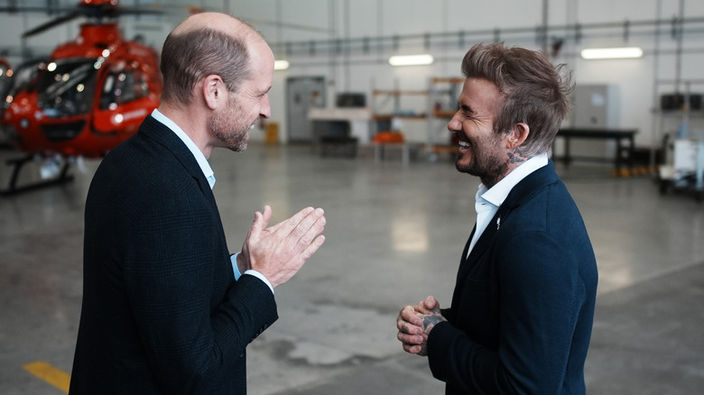 Prince William and David Beckham laughing