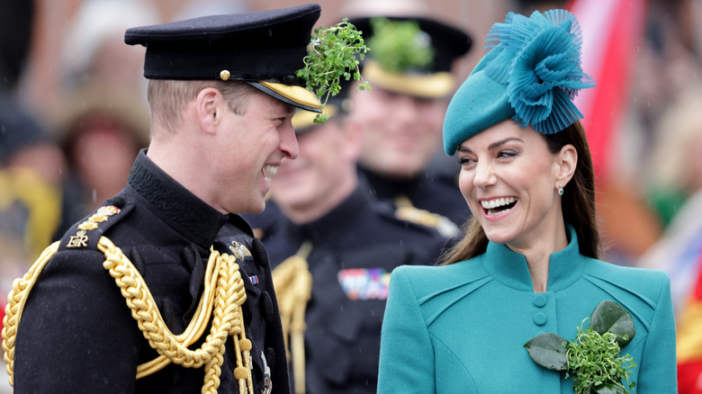 Prince William and Kate Middleton laughing and smiling at each other