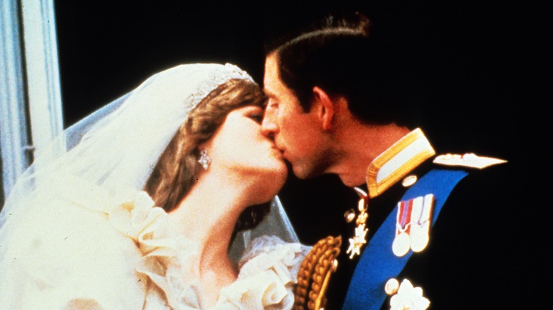 Princess Diana and Prince Charles kissing