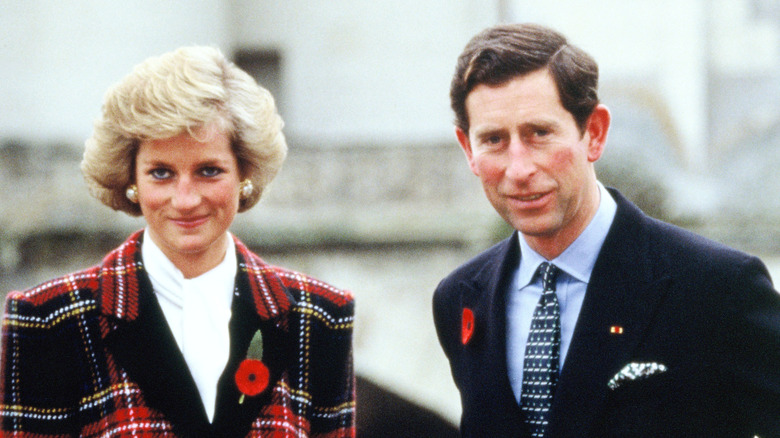 Princess Diana and Prince Charles outside