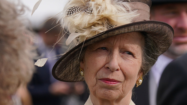 Princess Anne feathered hat pearl earrings