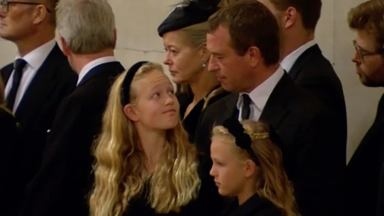 Savannah, Isla, and Peter Phillips at Queen's vigil