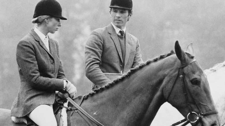 Princess Anne and Mark Philips on horseback