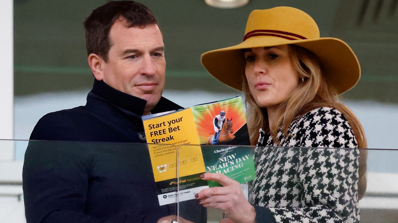 Peter Phillips with Harriet Sperling looking at pamphlet