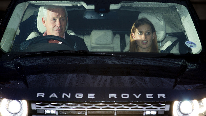 Princess Beatrice being driven in a Range Rover