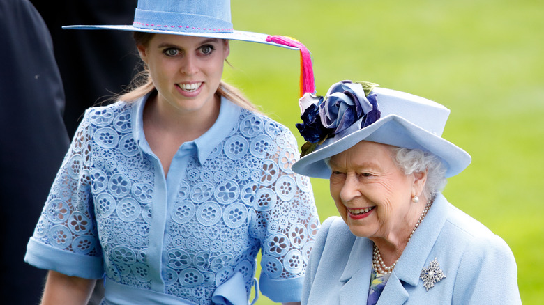 Princess Beatrice and Queen Elizabeth in matching blue outfits