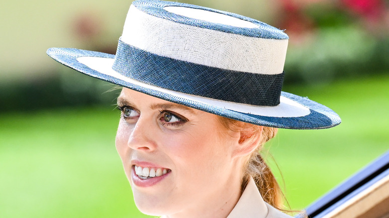 Princess Beatrice in a white and blue hat