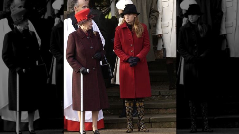 Princess Beatrice in bejeweled boots and red coat