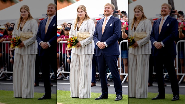 Princess Catharina-Amalia smiles with father