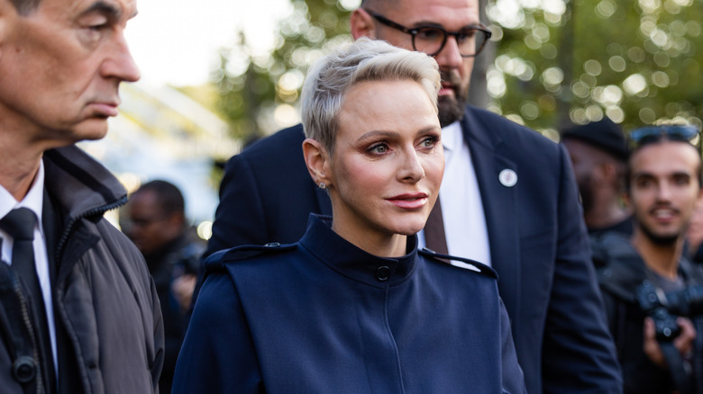 Princess Charlene walking in crowd