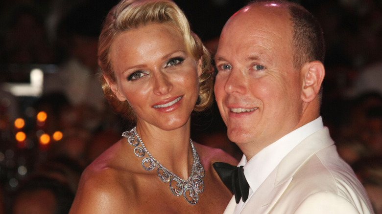 Princess Charlene and Prince Albert smiling