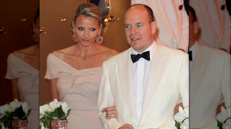 Charlene Wittstock smiling with Prince Albert