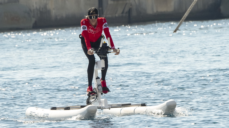 Princess Charlene pedaling a water bike in 2020