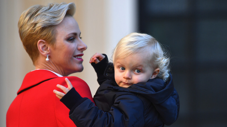 Princess Charlene of Monaco holding her son