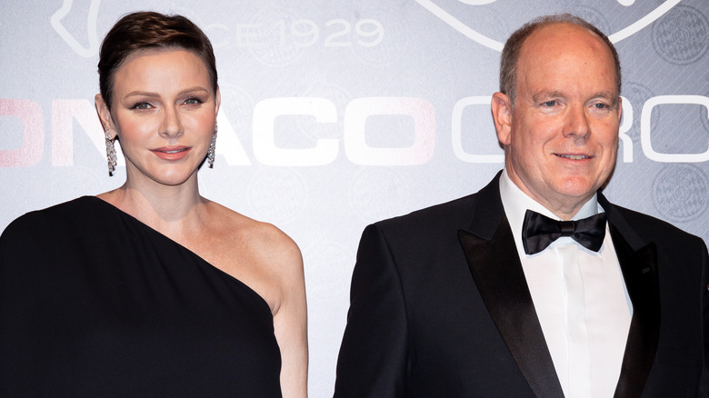 Princess Charlene and Prince Albert at event