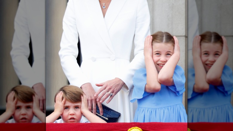 Prince Louis & Princess Charlotte covering ears on palace balcony