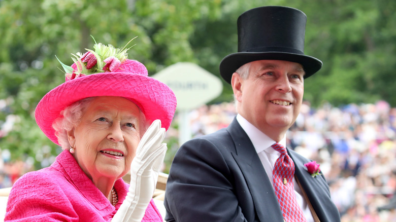 Queen Elizabeth waving and Prince Andrew smiling