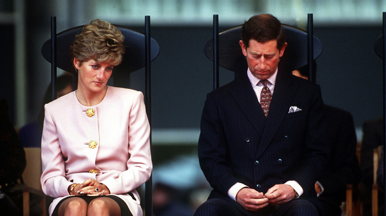 Princess Diana sitting beside King Charles