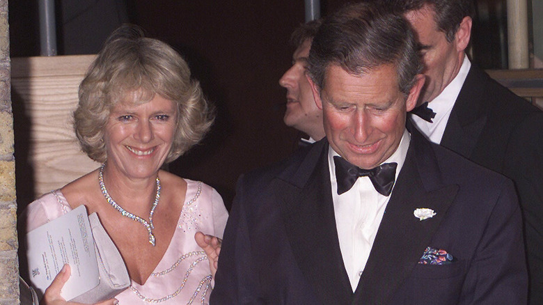 Charles and Camilla leave a reception in 1999