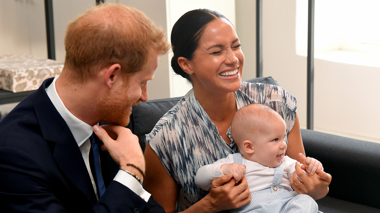 Prince Harry with wife and son