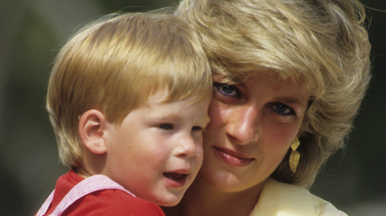 Princess Diana holding Prince Harry
