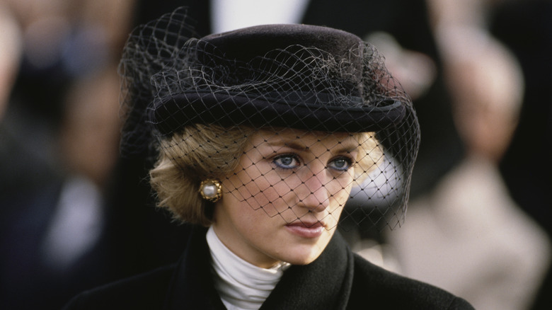 Princess Diana in black hat