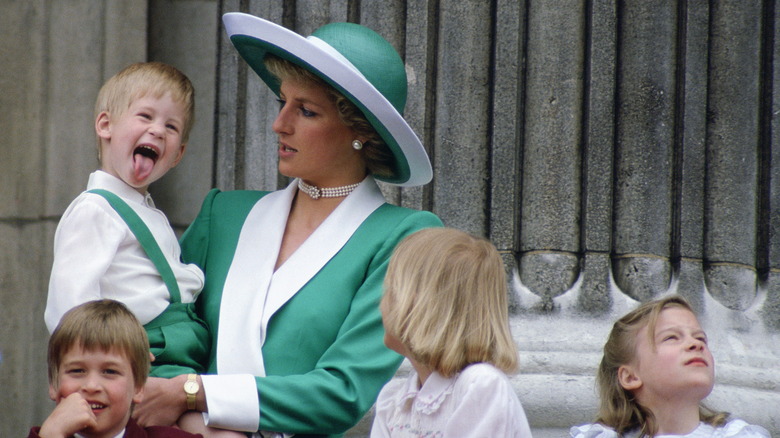 Princess Diana holds Prince Harry 