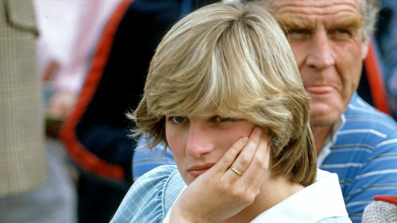 Princess Diana leaning into her hand