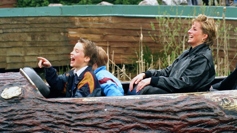 Princess Diana with Prince William and Prince Harry on a ride