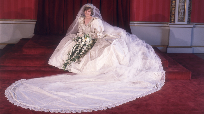 Princess Diana posing in her wedding dress