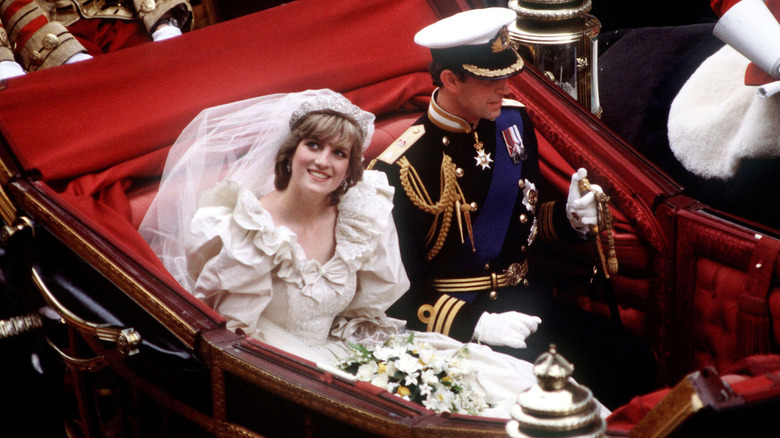 Princess Diana and Prince Charles in a carriage at their royal wedding