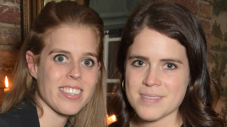 Princess Eugenie and Princess Beatrice posing