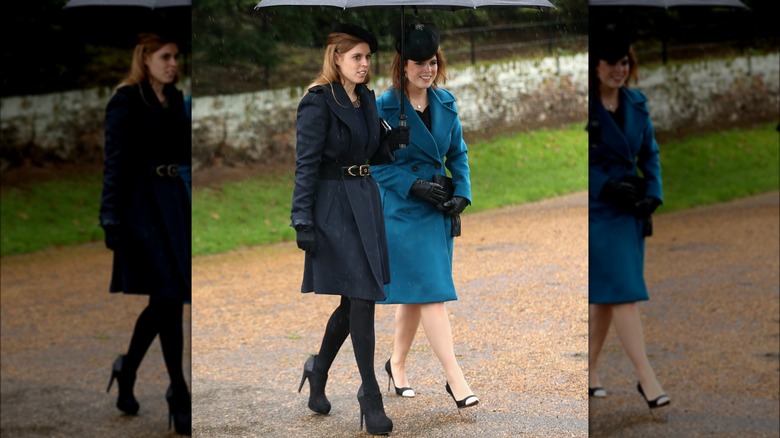 Princess Eugenie and Beatrice in blue coats 