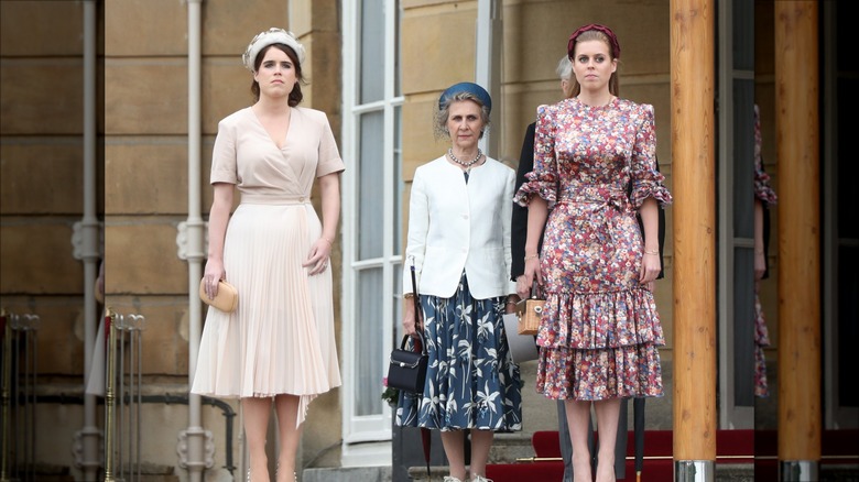 Princess Beatrice and Princess Eugenie in dresses