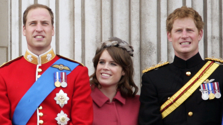 Princess Eugenie between Prince William and Prince Harry