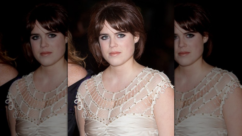 Closeup of Princess Eugenie wearing white dress in 2009