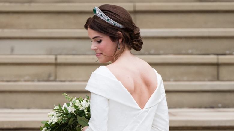 Princess Eugenie looking over her shoulder on her wedding day at St. George's Chapel